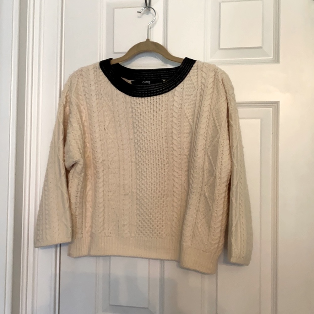 Wool sweater with leather neckline